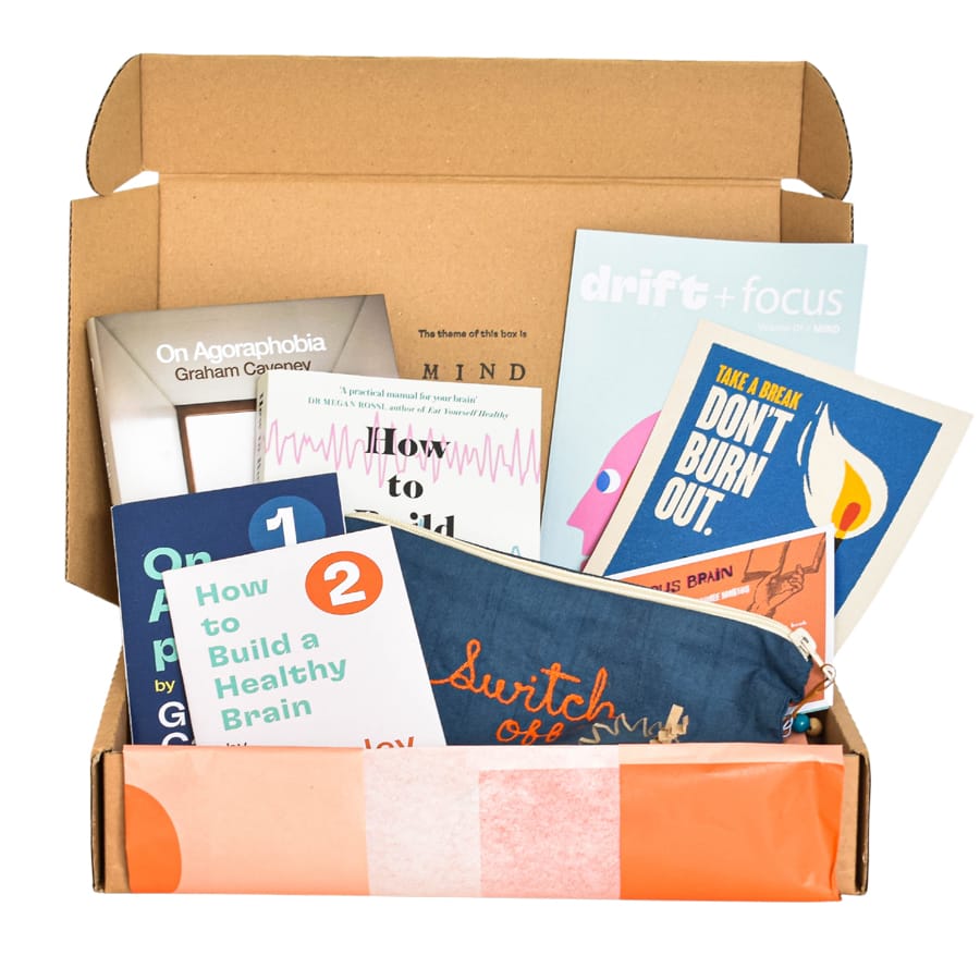 Quarterly book subscription boxes by Drift + Focus inside contents